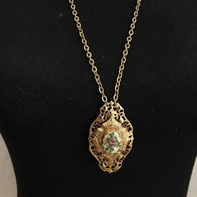 Vintage Rare Ornate flower cameo necklace. Very beautiful. Very nice.