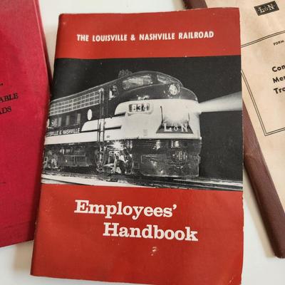 Sale Photo Thumbnail #460: This auction lot is for a Trio of L&N Railroad Handbooks and Manuals.  INcluded in this grouping is an Employees Handbook, a Conductors Memorandum Book and a Maximum Allowable Load Book.  All well used but very different items for the railroad collector.