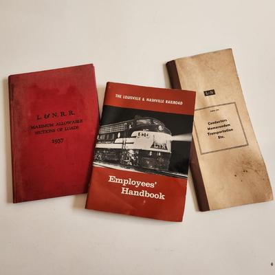 Sale Photo Thumbnail #458: This auction lot is for a Trio of L&N Railroad Handbooks and Manuals.  INcluded in this grouping is an Employees Handbook, a Conductors Memorandum Book and a Maximum Allowable Load Book.  All well used but very different items for the railroad collector.