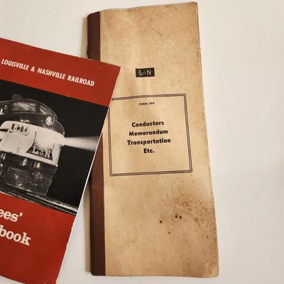 Sale Photo Thumbnail #461: This auction lot is for a Trio of L&N Railroad Handbooks and Manuals.  INcluded in this grouping is an Employees Handbook, a Conductors Memorandum Book and a Maximum Allowable Load Book.  All well used but very different items for the railroad collector.