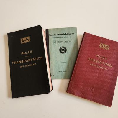 Sale Photo Thumbnail #475: This auction lot is for a Collection of L&N Operating Rule Books.  These three books have the rules of the L&N Transportation Department - nice find for that L&N Railroad Collector.