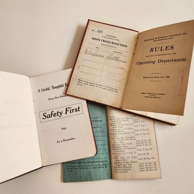 Sale Photo Thumbnail #480: This auction lot is for a Collection of L&N Operating Rule Books.  These three books have the rules of the L&N Transportation Department - nice find for that L&N Railroad Collector.