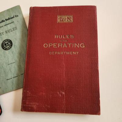 Sale Photo Thumbnail #477: This auction lot is for a Collection of L&N Operating Rule Books.  These three books have the rules of the L&N Transportation Department - nice find for that L&N Railroad Collector.