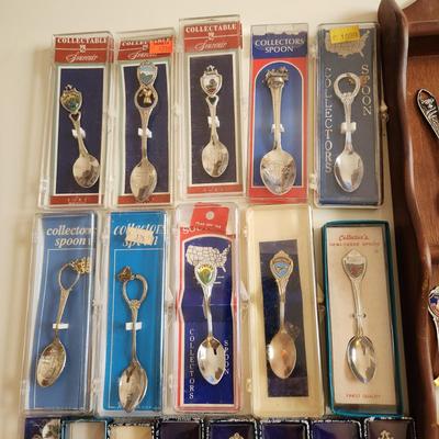 Sale Photo Thumbnail #484: This auction lot is for the Souvenir Spoon Collection with Wood Display.  From an estate this is the collection as found.  It contains 45 spoons, many still in the box. From travels all over - ready use or resell, bid high and bid often.