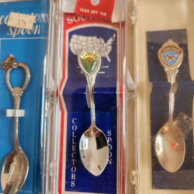 Sale Photo Thumbnail #489: This auction lot is for the Souvenir Spoon Collection with Wood Display.  From an estate this is the collection as found.  It contains 45 spoons, many still in the box. From travels all over - ready use or resell, bid high and bid often.