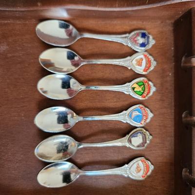 Sale Photo Thumbnail #487: This auction lot is for the Souvenir Spoon Collection with Wood Display.  From an estate this is the collection as found.  It contains 45 spoons, many still in the box. From travels all over - ready use or resell, bid high and bid often.
