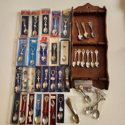 Sale Photo Thumbnail #481: This auction lot is for the Souvenir Spoon Collection with Wood Display.  From an estate this is the collection as found.  It contains 45 spoons, many still in the box. From travels all over - ready use or resell, bid high and bid often.