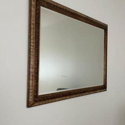 Mirror in gold frame