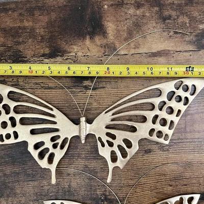 Brass butterflies, 2