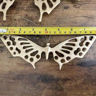 Brass butterflies, 2