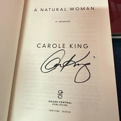 Lot 162 two hardcover books signed by author one book signed by Carole King