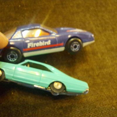 Magic eight ball and vintage toy cars