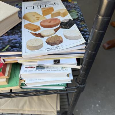 Sale Photo Thumbnail #68: This is for 1 shelf of books. Misc. 
Box’s are not included. They are in a different lot.