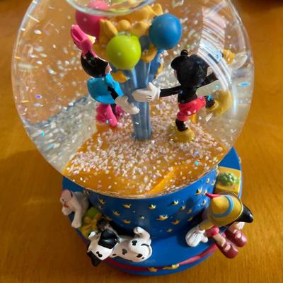 Disney water globe has broken pieces