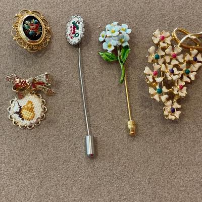 Needle work and floral pins