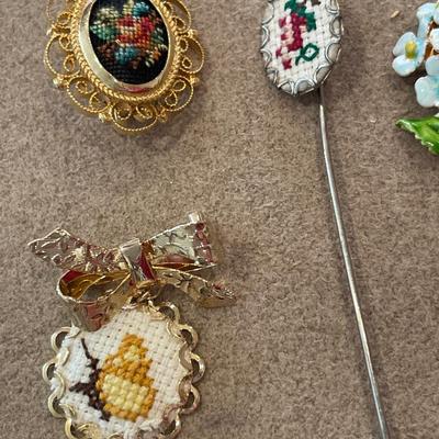 Needle work and floral pins