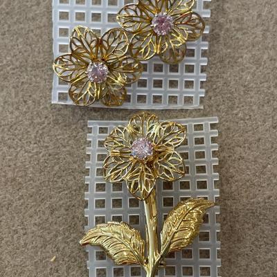 Gold tone and pink pins