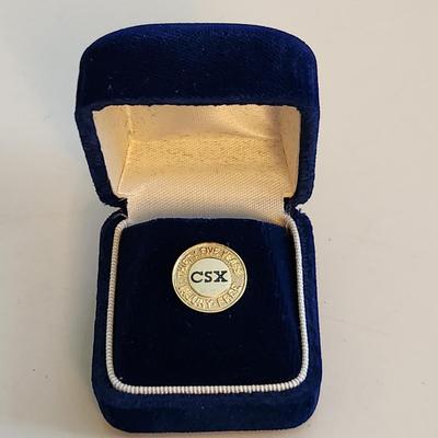 Sale Photo Thumbnail #495: This auction lot is for a CSX Railroad 35 Year Gold Service Pin. The pin is marked 1/10 10K on the verso.  Great for the railroad collector.