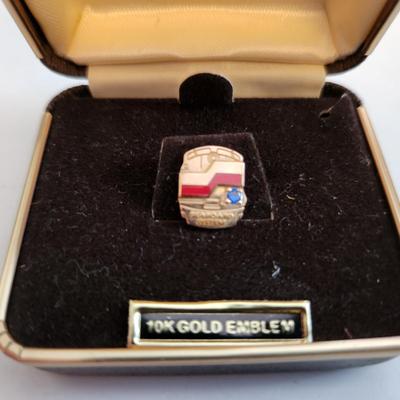 Sale Photo Thumbnail #498: This auction lot is for a Seaboard Railroad System Gold Service Pin with Jewel.  The pin/tie tack is marked 10K on the verso.  Great for most any railroad collector. Nice gem stone.