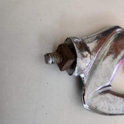 Sale Photo Thumbnail #57: This auction lot is for a Devil Hood Ornament.  The devil you say - as he razzes you back. This nifty find would look perfect mounted on so many things - from you car or bike to who know what.  Chrome plated metal with screw base.  See photo for size.  Wh