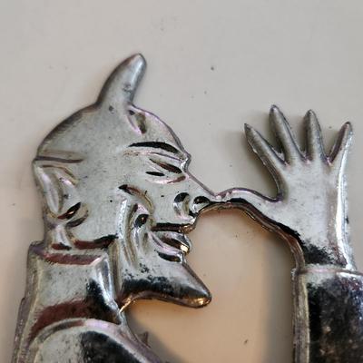 Sale Photo Thumbnail #58: This auction lot is for a Devil Hood Ornament.  The devil you say - as he razzes you back. This nifty find would look perfect mounted on so many things - from you car or bike to who know what.  Chrome plated metal with screw base.  See photo for size.  Wh