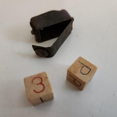 Sale Photo Thumbnail #61: This auction lot is for Vintage Die Game in Leather Pouch.  We don't know the game this item is used to play - if you do please educate us.  Whatever it is a neat find and a great curiosity to hold.