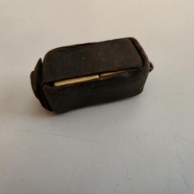 Sale Photo Thumbnail #59: This auction lot is for Vintage Die Game in Leather Pouch.  We don't know the game this item is used to play - if you do please educate us.  Whatever it is a neat find and a great curiosity to hold.