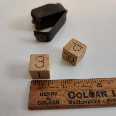 Sale Photo Thumbnail #62: This auction lot is for Vintage Die Game in Leather Pouch.  We don't know the game this item is used to play - if you do please educate us.  Whatever it is a neat find and a great curiosity to hold.
