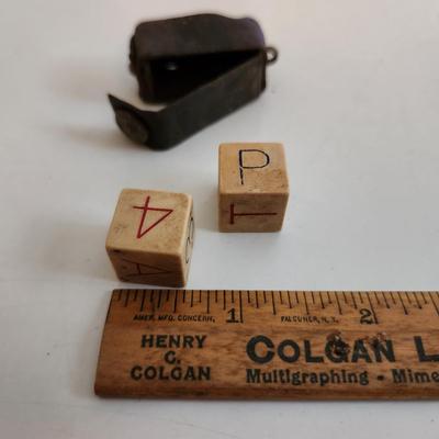 Sale Photo Thumbnail #63: This auction lot is for Vintage Die Game in Leather Pouch.  We don't know the game this item is used to play - if you do please educate us.  Whatever it is a neat find and a great curiosity to hold.