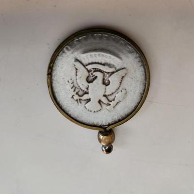 Sale Photo Thumbnail #527: This auction lot is for a Well-Worn Kennedy Half Dollar Watch Fob.  The encasement ring "might" be gold but it is not marked.  Used by an L&N Railroad Train Conductor for many years.
