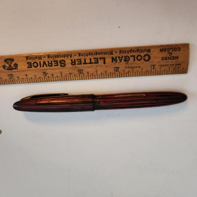 Sale Photo Thumbnail #538: This auction lot is for a Vintage Schaeffer Fountain Pen with Gold Nib.  The #33 nib is marked 14K.  The pen has a nice reddish case - not sure if it would work without some work.