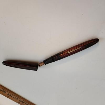 Sale Photo Thumbnail #537: This auction lot is for a Vintage Schaeffer Fountain Pen with Gold Nib.  The #33 nib is marked 14K.  The pen has a nice reddish case - not sure if it would work without some work.
