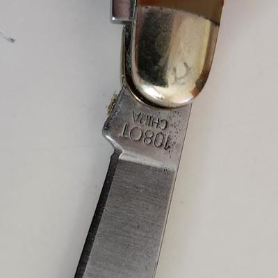 Sale Photo Thumbnail #542: This auction lot is for and Old Timer Pocket Knife by Schrade.  This is a 3-blade knife in pretty good condition for being carried for a few years by its former owner.  Ready for your pocket or purse.