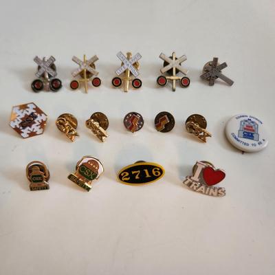 Sale Photo Thumbnail #548: This auction lot is for a Collection of Railroad Pins.  This gathering of 16 various pins speak to a long love of them.  The 2716 pin refers to an antique locomotive.  Great grouping for the collector or the reseller.