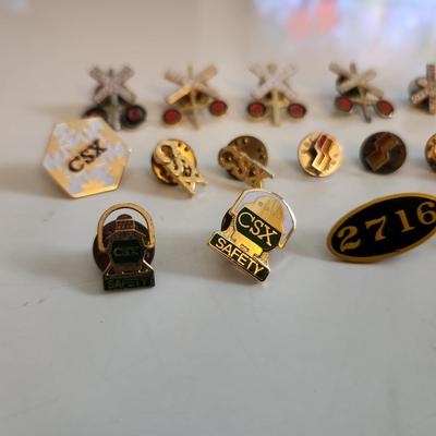 Sale Photo Thumbnail #552: This auction lot is for a Collection of Railroad Pins.  This gathering of 16 various pins speak to a long love of them.  The 2716 pin refers to an antique locomotive.  Great grouping for the collector or the reseller.