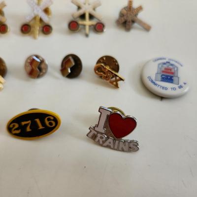 Sale Photo Thumbnail #549: This auction lot is for a Collection of Railroad Pins.  This gathering of 16 various pins speak to a long love of them.  The 2716 pin refers to an antique locomotive.  Great grouping for the collector or the reseller.