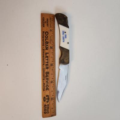Sale Photo Thumbnail #556: This auction lot is for a Comanche Cutlery Pocket Knife.  This knife is dated 1988 and was most likely a prize given at the rail yard for Safety.  The blade is marked surgical steel.  Nice 1-blade pocket knife for everyday use.
