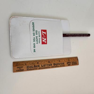 Sale Photo Thumbnail #562: This auction lot is for a L&N Railroad Pocket Protector & Pencil.  Nice small items for the railroad and/or L&N collector.