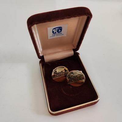 Sale Photo Thumbnail #569: This auction lot is for a set of Vintage Locomotive Cuff Links.  They have a nice design and good coloration.  No markings.