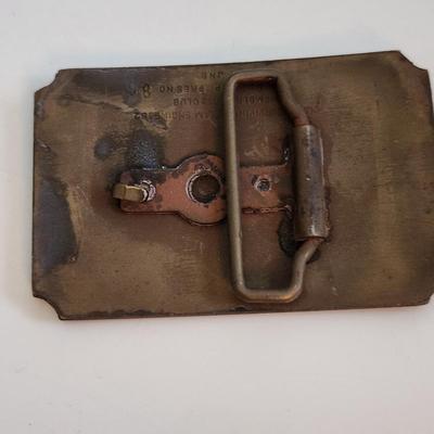 Sale Photo Thumbnail #583: This auction lot is for a L&N Locomotive #152 Belt Buckle. This heavy-duty buckle is quite the memento of a bygone era.  This locomotive was one of the last great steam engines.  You can see the real thing at the museum in New Haven, KY.
