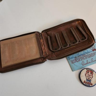 Sale Photo Thumbnail #594: This auction lot is for a Vintage Leather Child's Wallet with Contents.  The wallet itself is quite the find but the contents are also interesting.  There is an Archie's Club Membership Card with an Archie's Pin, a Boy Scout card, a Knot Hole Gang Card fr