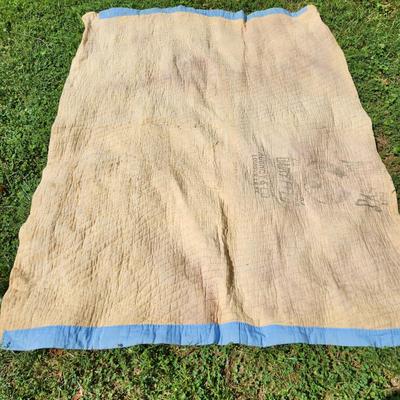Sale Photo Thumbnail #4: This auction lot is for an Antique Crazy Star Quilt.  This quilt has been spread on a few beds but has a nice antique look and feel.  The verso shows that it was backed with old feed sacks from Louisville, KY.  Overall the quilt is good, the backing has a