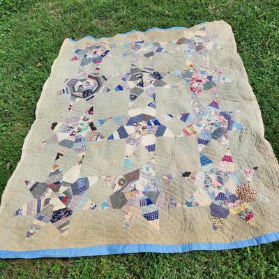 Sale Photo Thumbnail #3: This auction lot is for an Antique Crazy Star Quilt.  This quilt has been spread on a few beds but has a nice antique look and feel.  The verso shows that it was backed with old feed sacks from Louisville, KY.  Overall the quilt is good, the backing has a