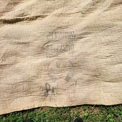 Sale Photo Thumbnail #5: This auction lot is for an Antique Crazy Star Quilt.  This quilt has been spread on a few beds but has a nice antique look and feel.  The verso shows that it was backed with old feed sacks from Louisville, KY.  Overall the quilt is good, the backing has a