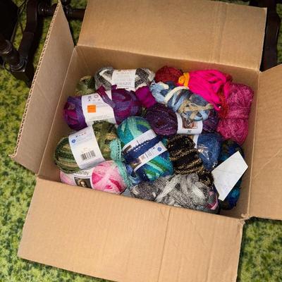 Sale Photo Thumbnail #4: Two boxes of various types/colors of yarn.