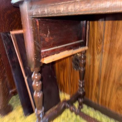 Sale Photo Thumbnail #9: Small table with removable shelf. Does NOT include items on top of table. See pictures for signs of typical wear.
Roughly 30" tall, 37" wide, 18.5" deep