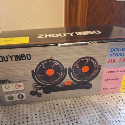 Double fan for a vehicle