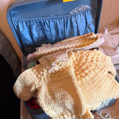 Sale Photo Thumbnail #70: Cute blue case full of doll(?) clothes, baby rattle