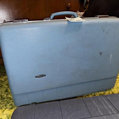 Sale Photo Thumbnail #97: Two hardside suitcases. See photos for details