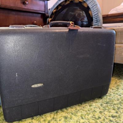 Sale Photo Thumbnail #98: Two hardside suitcases. See photos for details